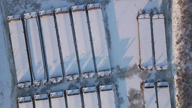 Winter parking of barges and ships in Siberia