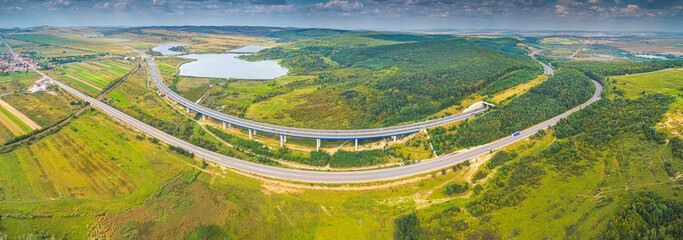 Aerial view of A1 Transylvania Highway between Sibiu and Sebes with spectacular viaduct bridge and...