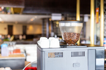 big coffee with coffee beans machine in a bar 