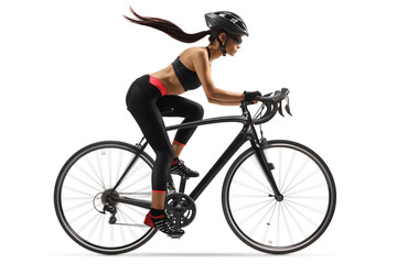 Full length profile shot of a female cyclist riding a road bike