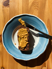 Banana Bread Slice with Creamy Peanut Butter Cream Paste.