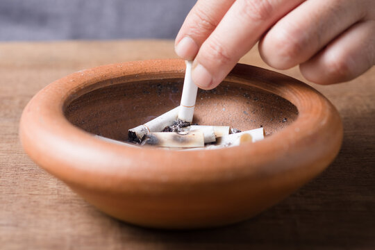 Quenching Ciggarette in the Ashtray