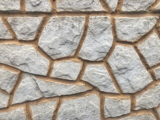 Nature background of decorative gray granite stone wall texture