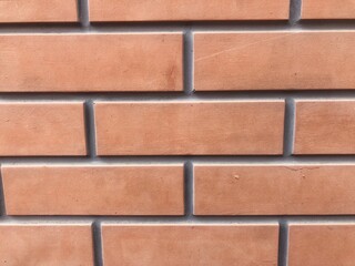 red brick wall close-up. Red classic brick texture