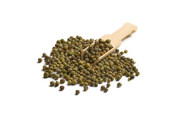 Heap of dry green peppercorn on white
