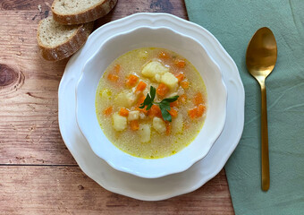 Viennese, healthy potato soup. This vegetarian version is made with carrot, onions, garlic, celery, potatoes, flour, vegetable soup, sour cream, vinegar and marjoram.