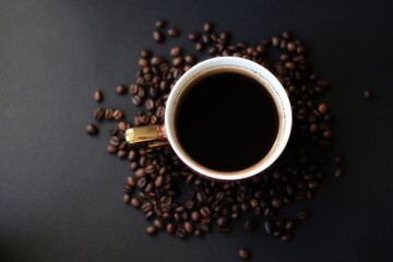 black natural coffee and roasted coffee beans