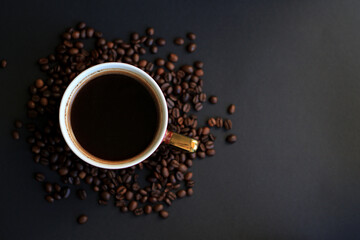 black natural coffee and roasted coffee beans