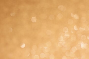 Blur background beige bokeh.  Abstract beige bokeh circles for Christmas background.