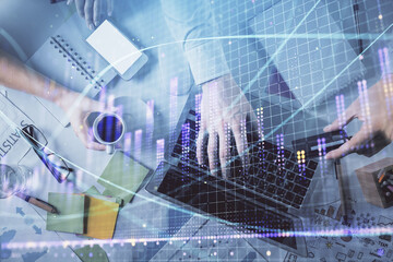 Double exposure of man and woman working together and forex graph hologram drawing. Financial analysis concept. Computer background. Top View.