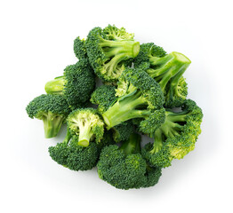 Cut broccoli placed on a white background