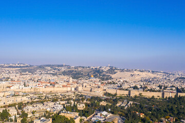 Fototapeta na wymiar Jerusalem old city rooftops and The Dome of The Rock, Aerial view. 