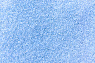 Fototapeta na wymiar Winter snowy background with snow crystals. Copy space, horizontal, textured frozen surface, natural