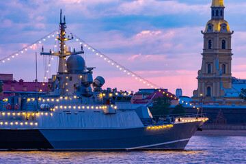 Saint Petersburg. Russia. The warship is decorated with garlands. Ship on the background of the...