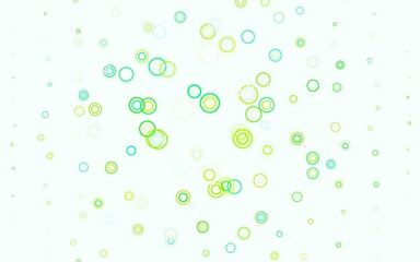 Light Blue, Green vector backdrop with dots.