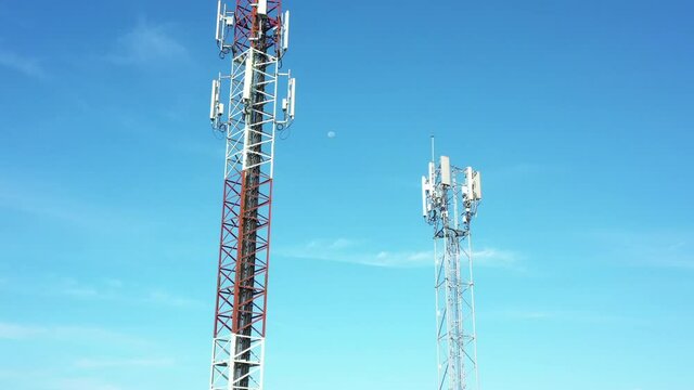 Footage 4k B-roll Aerial drone view of tower antennas Telecommunication cell phone, radio transmitters of cellular 5g 4g mobile and smartphones