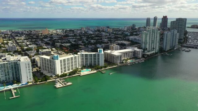 Building on Miami Beach Bay 4k aerial clip