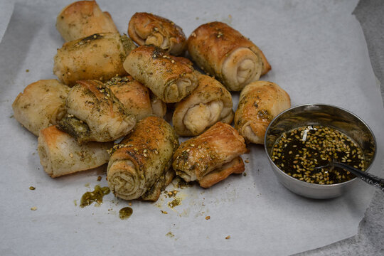 Bread rolls brushed with zaatar and olive oil