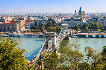 Fototapeta na wymiar The Szechenyi Chain Bridge that spans the River Danube between Buda and Pest sides of Budapest, Hungary