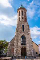 Fototapeta na wymiar Marie Magdalene church's belltower in the Royal Palace Buda in Budapest, Hungary, built in 13th century