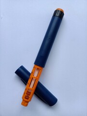 Close-up of insulin pen before meal