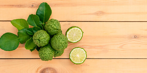Fresh bergamot from nature Resting on a wooden chopping board To be used as a cook and nourishing hair and skin.