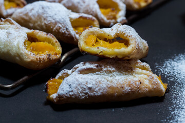 Homemade mango puff pastry with powdered sugar