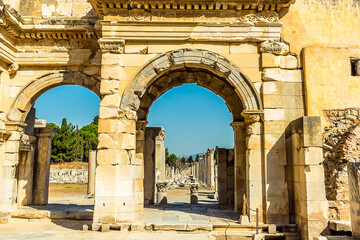 Fototapeta na wymiar The Gate of Mazeus and Mithridates leading to the Agora in Ephesus, Turkey