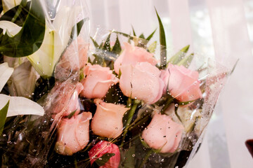 Bouquet of pink roses and white lilies