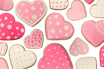 background from pink cookies heart shaped with different patterns, isolated