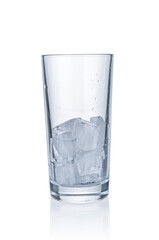 Water glass with ice cubes isolated on white background