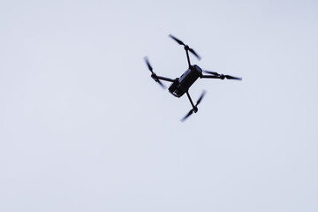 Drone flying over sky background