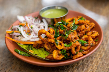 Naadan koonthal roast or Kerala spicy squid fry