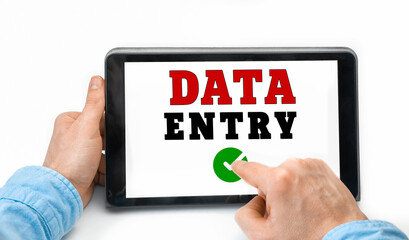 Closeup of a male hands holding tablet pc with text Data Entry
