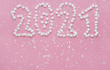 pink christmas background with snowflakes