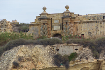 A pillbox in front of the entrance to Fort Ricasoli at Kalkara, Malta.