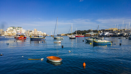 Obraz premium Boats moored in Marsamxett Harbour in Gzira, Malta.