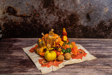 Obraz na płótnie Canvas Autumn decoration still life with colorful pumpkins and walnuts