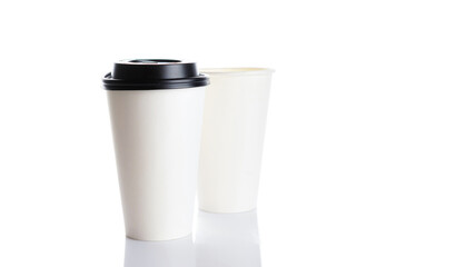 White paper cup for hot coffee with black lid isolated on white background. Takeaway blank small tea cup for your design text or banner of brand.