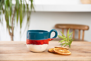hand made ceramic coffee cup on the table