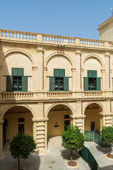 Fototapeta na wymiar The courtyard of Grandmaster's Palace in Valletta, Malta.