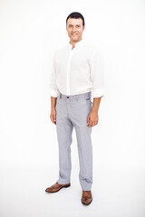Fototapeta premium A man in a classic suit. Studio photo on a white background. Snapshot as for a catalog.