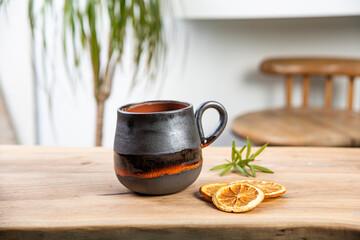 cup of coffee on wooden table