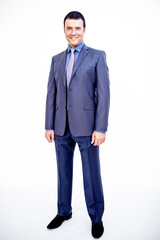 A man in a classic suit. Studio photo on a white background. Snapshot as for a catalog.