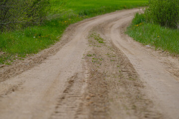 endless beautiful country gravel road in perspective
