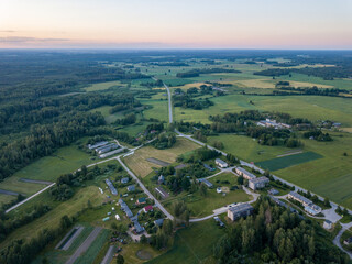 summer fields forests and roads in countryside view from above drone image