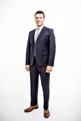 A man in a classic suit. Studio photo on a white background. Snapshot as for a catalog.