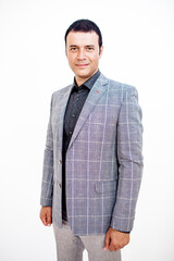 A man in a classic suit. Studio photo on a white background. Snapshot as for a catalog.