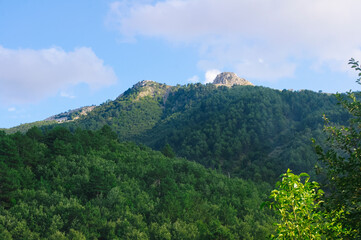 Green mountains and blue sky.