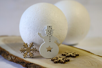 Decorative Christmas composition with symbolic house, snowman, animals, snowflakes and balls on a...